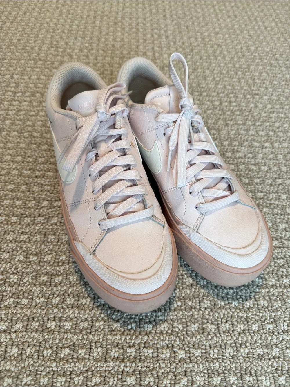 Nike Light Pink Low-Top Sneakers with White Swoosh